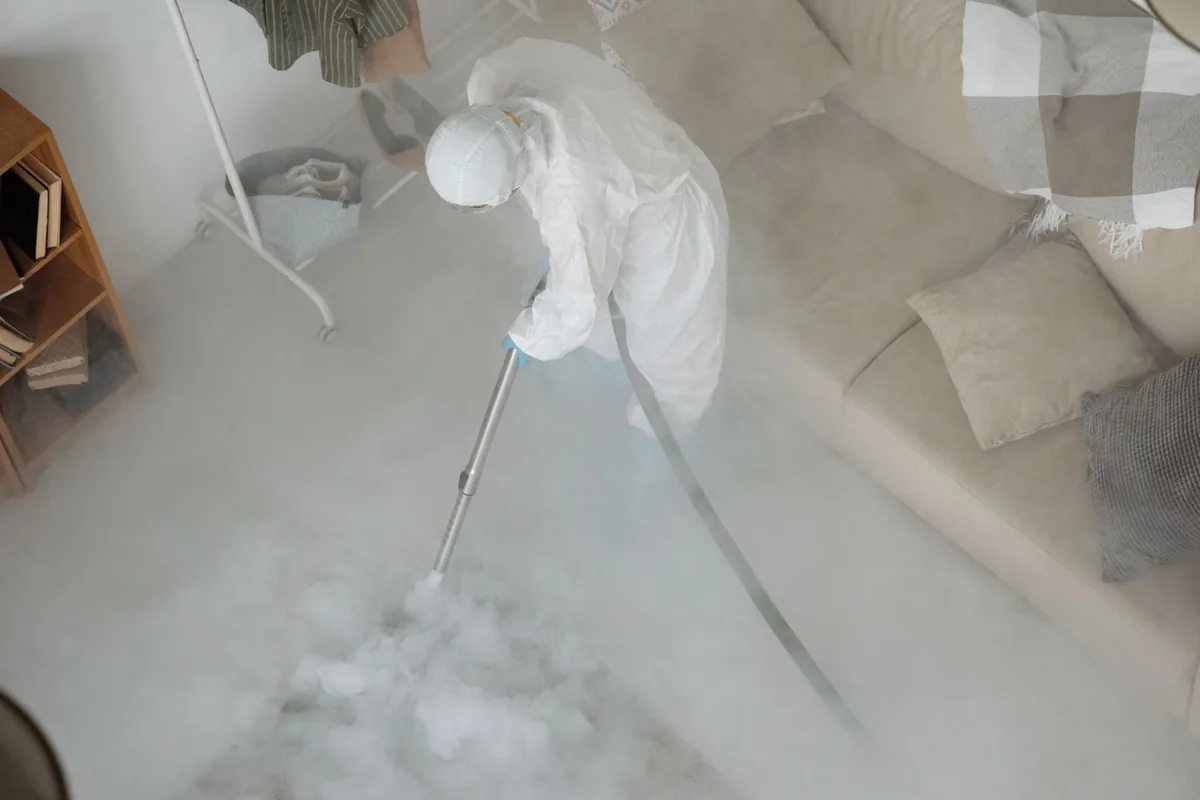 Biohazard cleanup technician in protective equipment, Rolling Hills, CA